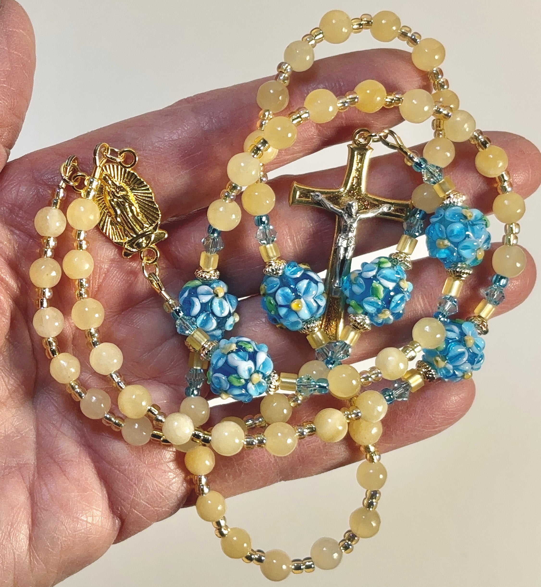 Saint Francis Garnet Tiger Eye Rosary with Olive Wood Tau Cross
